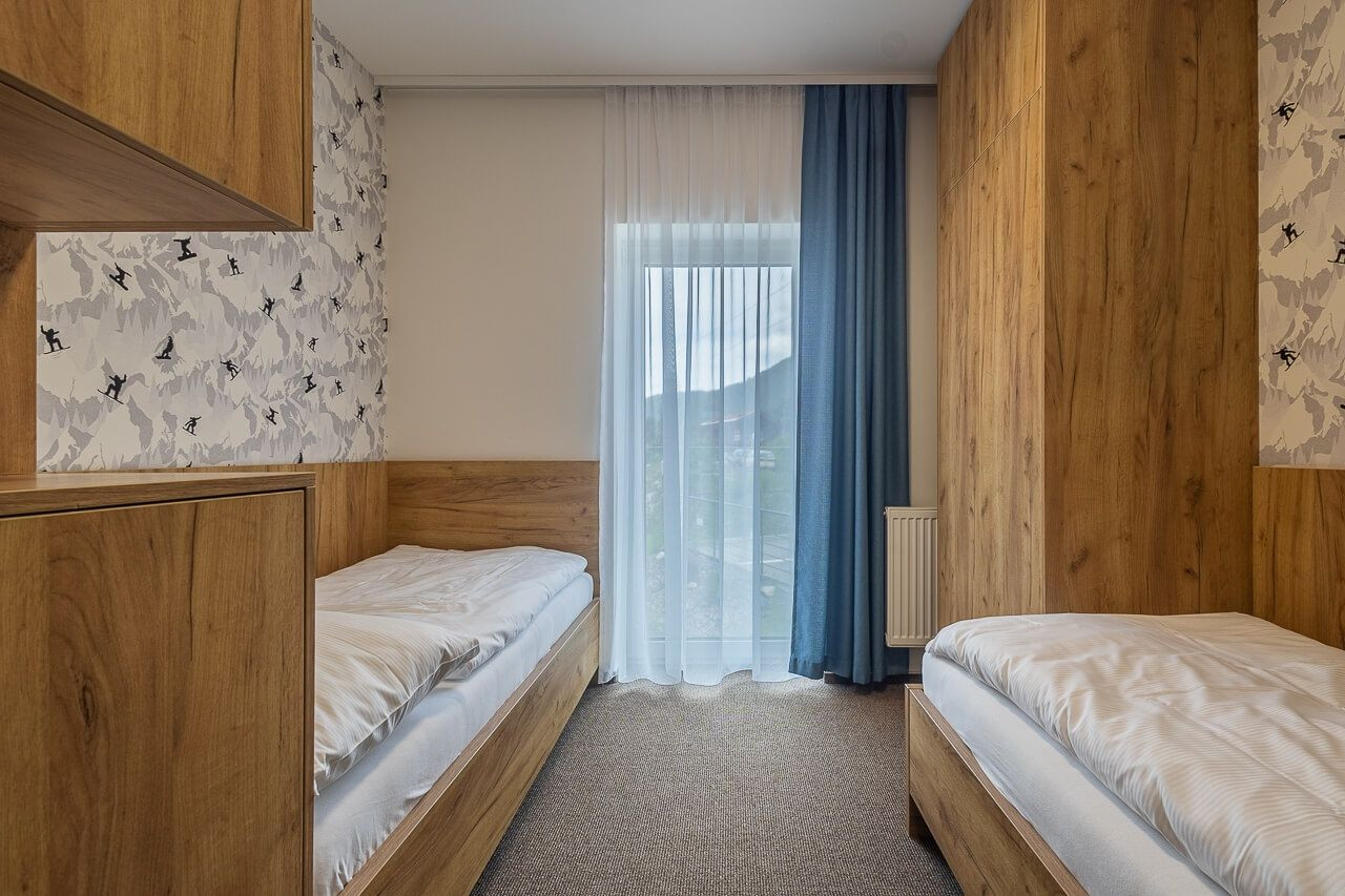 Luxusný horský dvojspálňový apartmán s parkovacím státím v lyžiarskom stredisku Jasná