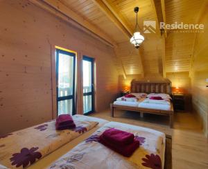 Na predaj štýlové drevenice na brehu Liptovskej Mary