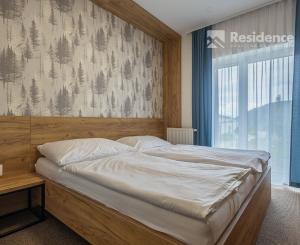 Luxusný horský dvojspálňový apartmán s parkovacím státím v lyžiarskom stredisku Jasná