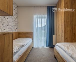 Luxusný horský dvojspálňový apartmán s parkovacím státím v lyžiarskom stredisku Jasná