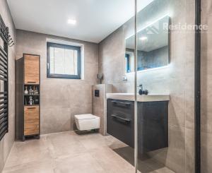 Family house in a quiet area of Dovalovo with a stream
