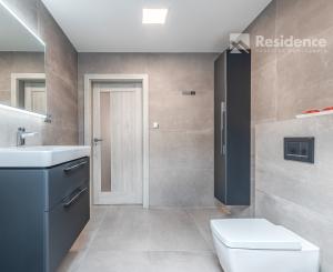 Family house in a quiet area of Dovalovo with a stream