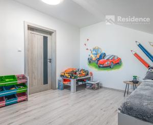 Family house in a quiet area of Dovalovo with a stream