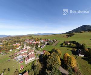 STAVEBNÝ POZEMOK V LAZISKU S PROJEKTOM RODINNÉHO DOMU | 569 m²
