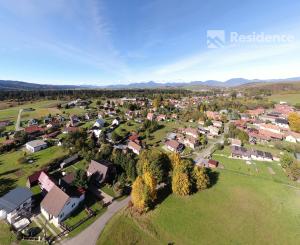 STAVEBNÝ POZEMOK V LAZISKU S PROJEKTOM RODINNÉHO DOMU | 569 m²