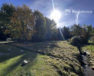 STAVEBNÝ POZEMOK V LAZISKU S PROJEKTOM RODINNÉHO DOMU | 569 m²