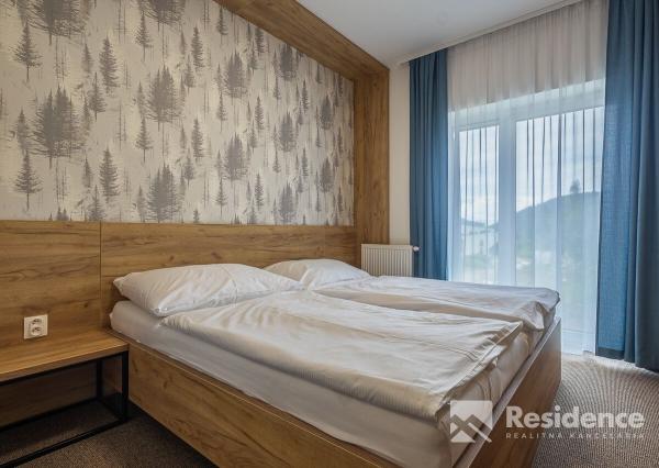 Luxusný horský dvojspálňový apartmán s parkovacím státím v lyžiarskom stredisku Jasná