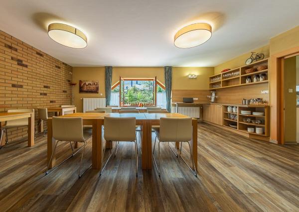 Zabehnutý penzión neďaleko Jasnej s veľkým pozemkom