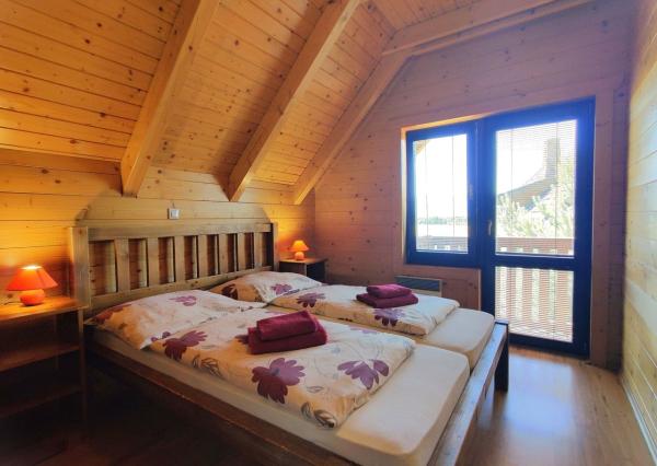 Na predaj štýlové drevenice na brehu Liptovskej Mary