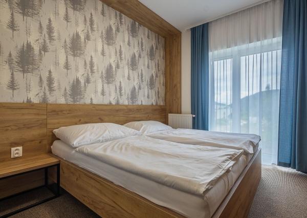 Luxusný horský dvojspálňový apartmán s parkovacím státím v lyžiarskom stredisku Jasná