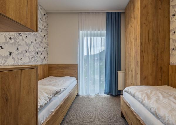 Luxusný horský dvojspálňový apartmán s parkovacím státím v lyžiarskom stredisku Jasná