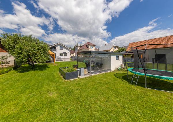 Family house in a quiet area of Dovalovo with a stream