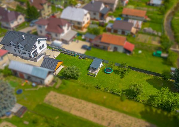 Family house in a quiet area of Dovalovo with a stream